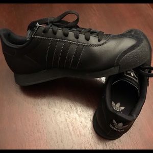 Men’s size 7 Adidas - fits women size 9